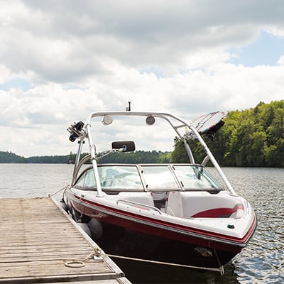 Speedboat tied at dock