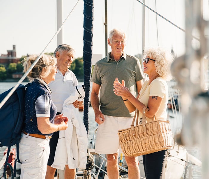 Group enjoying dockside conversation